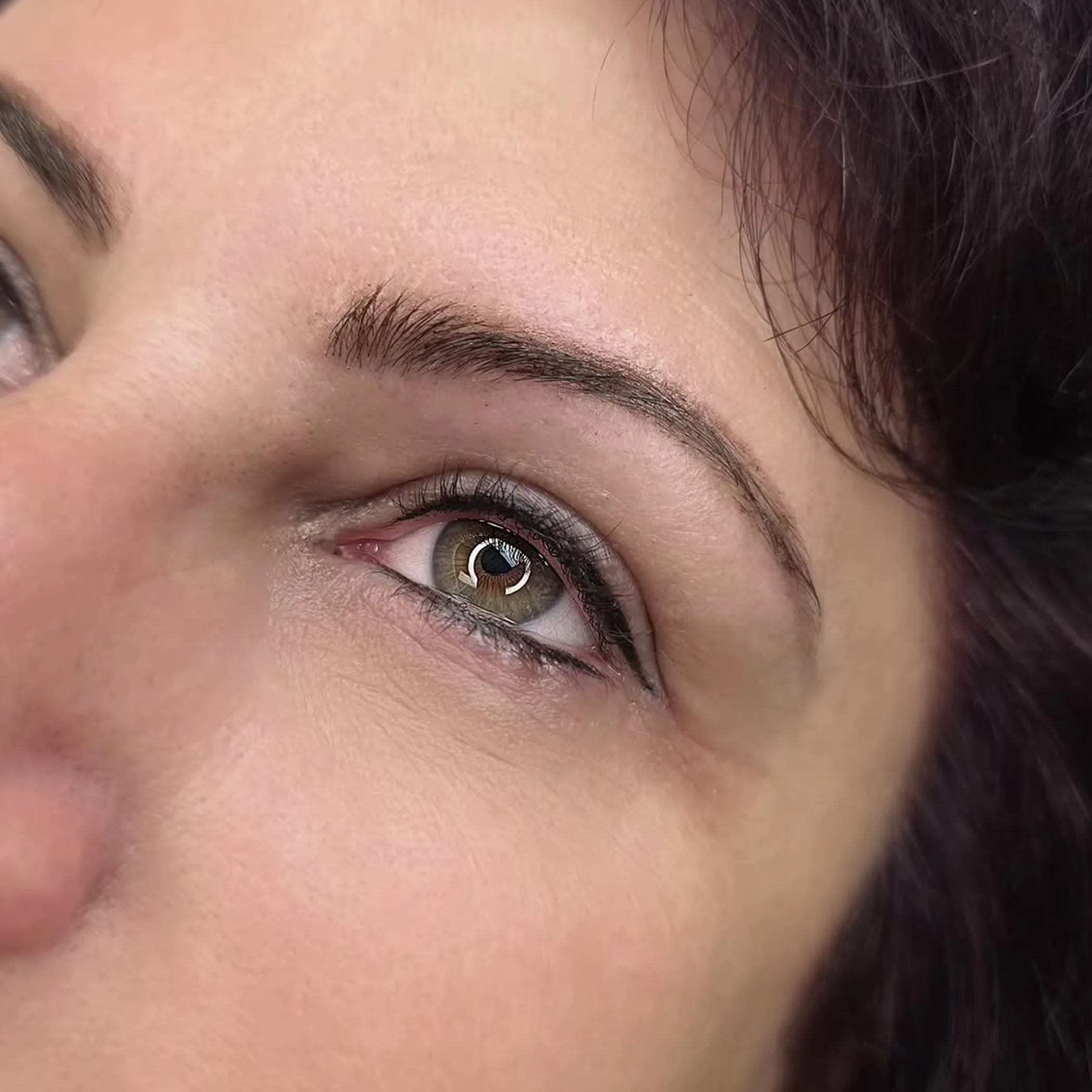 upper and lower eyeliner tattoo